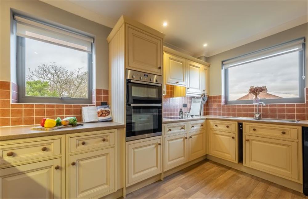 First floor: A double aspect kitchen at Thainstone House, Brancaster near Kings Lynn