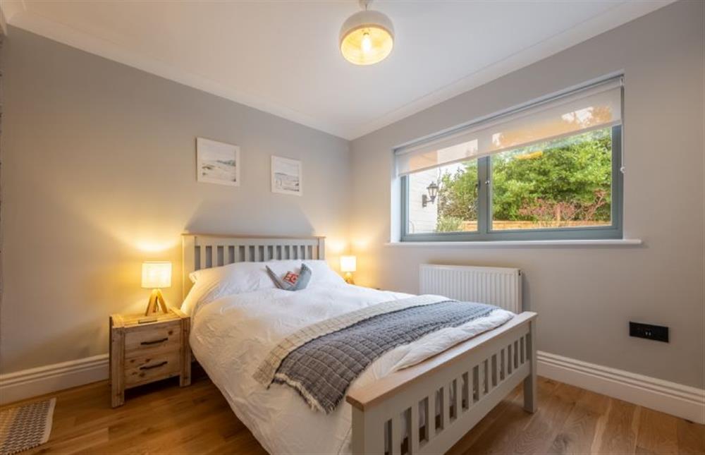 Ground floor: Bedroom two with double bed at Thainstone House, Brancaster near Kings Lynn