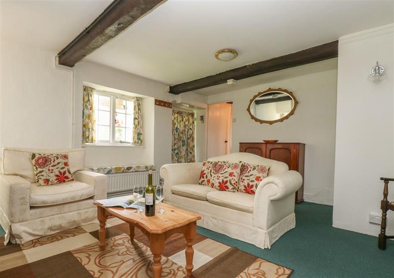 Enjoy the living room at Thatch Cottage, Buckland Newton
