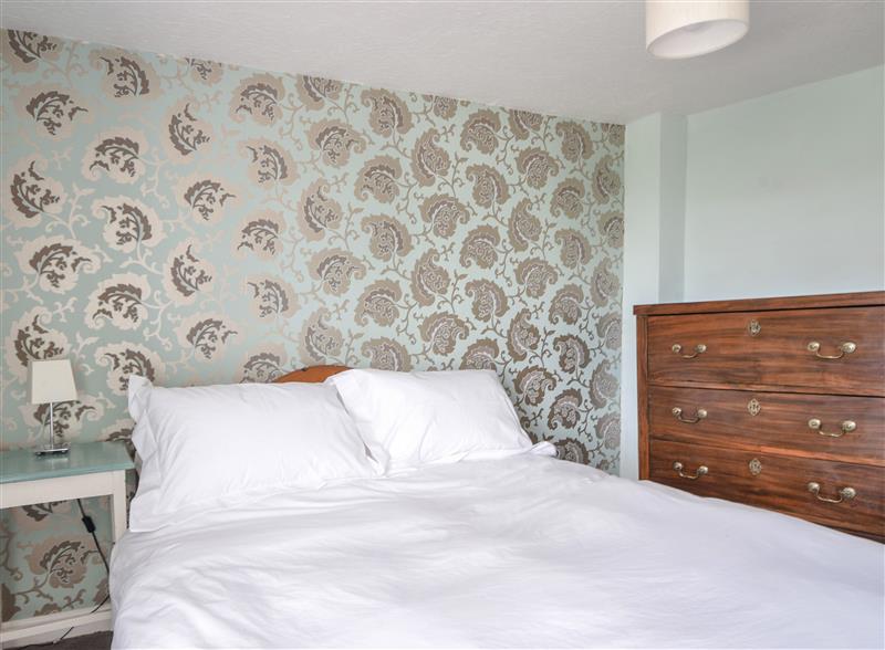 One of the 3 bedrooms at Thatched Cottage, Charmouth