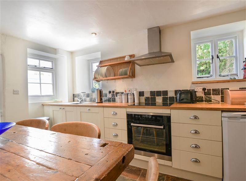 This is the kitchen (photo 2) at Thatched Cottage, Charmouth