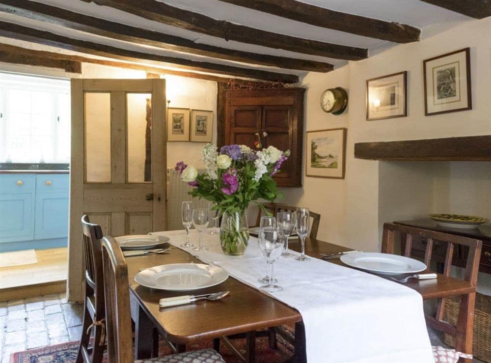 Dining room with bread oven and brick floor at Thatched Cottage in Sternfield, near Aldeburgh, Suffolk