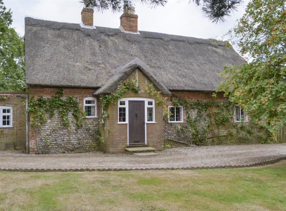 Idyllic front elevation of the holiday home at Thatched Cottage in Witton, near North Walsham, Norfolk