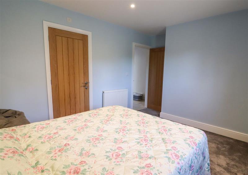 One of the bedrooms at Thatchers Barn, Toddington