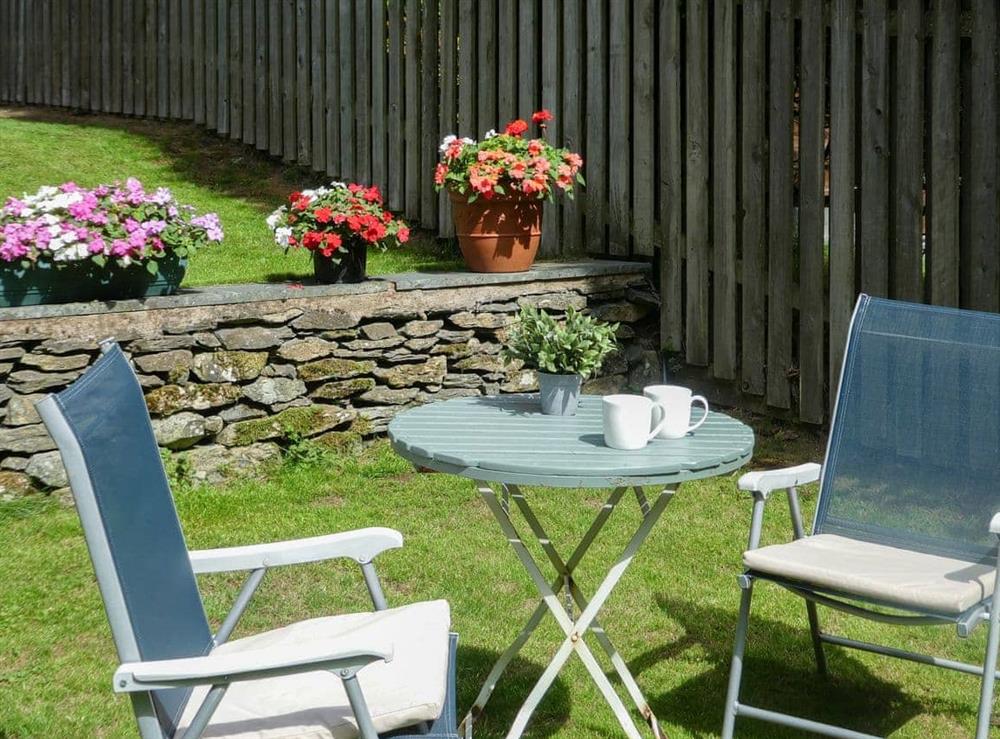 Lovely sunny garden in which to relax and unwind at The Farriers, 