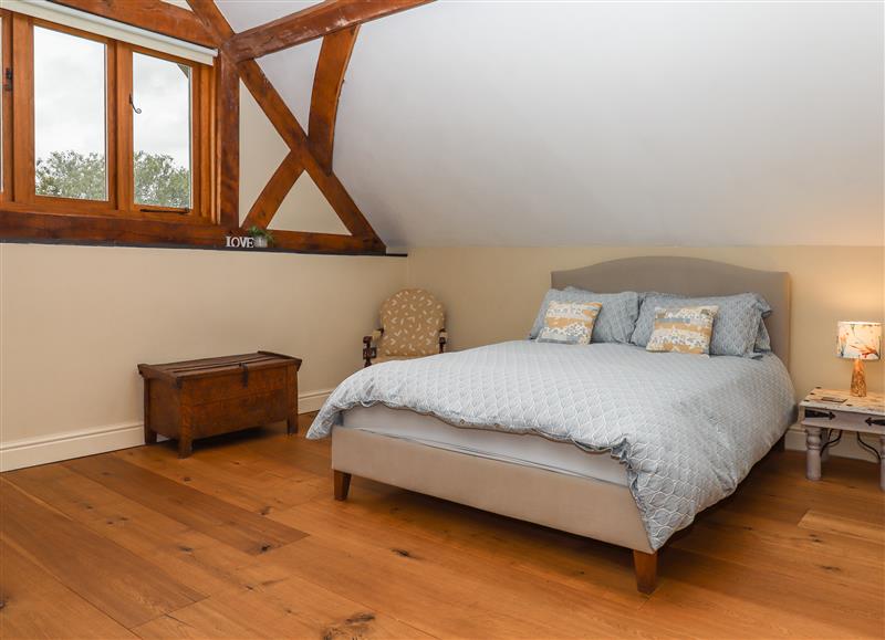 This is the bedroom at The Acorn Barn, Hittisleigh