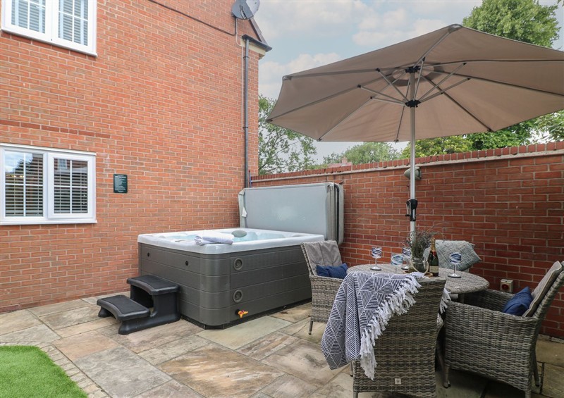 Enjoy a cup of tea on the patio at The Active Recovery Retreat, Yarnfield near Stone