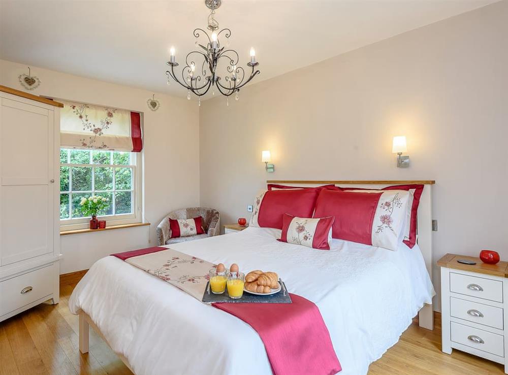 Romantic bedroom with kingsize bed at The Annex in Kirkby on Bain, near Horncastle, Lincolnshire