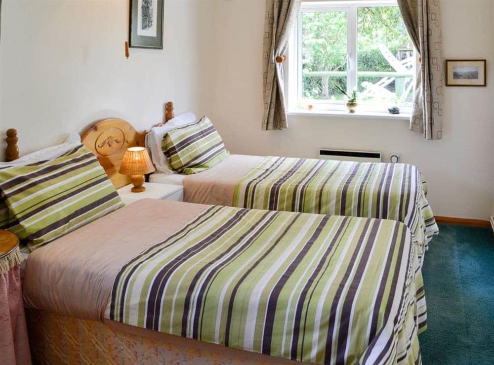 Inviting bedroom with zip and link beds for either a double or twin beds at The Annexe at Russets in Isle Brewers, near Taunton, Somerset