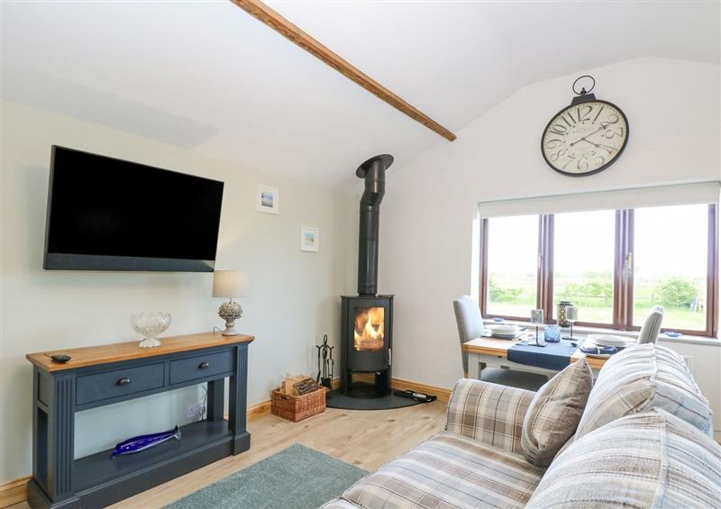 Relax in the living area at The Annexe, Grange Farm, Hainford