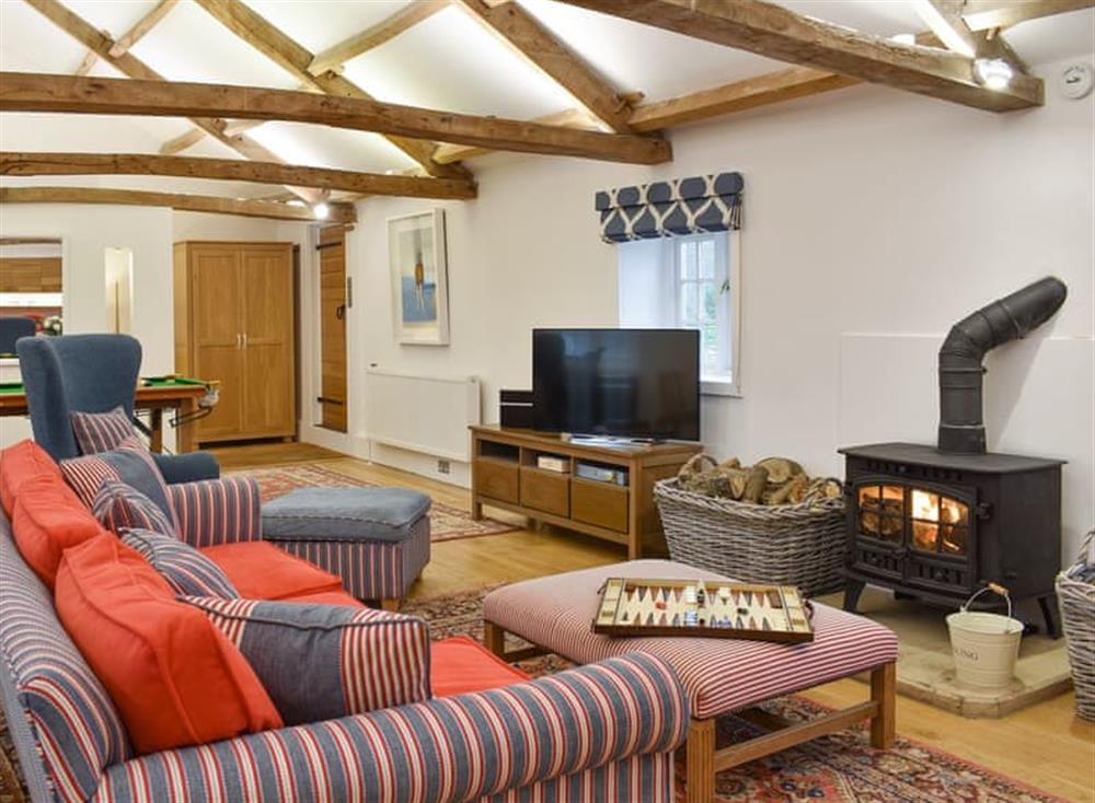 Characterful living area with exposed wood beams at The Annexe in Jervaulx, near Ripon, North Yorkshire
