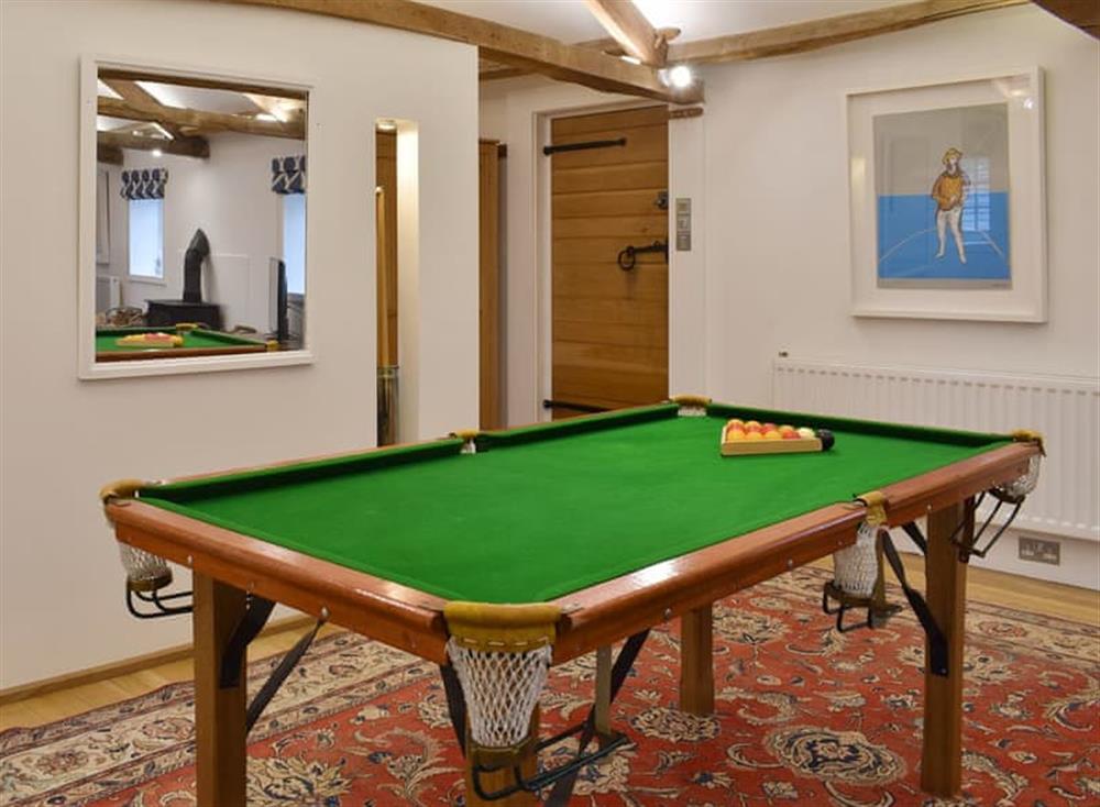 Games area with snooker game at The Annexe in Jervaulx, near Ripon, North Yorkshire