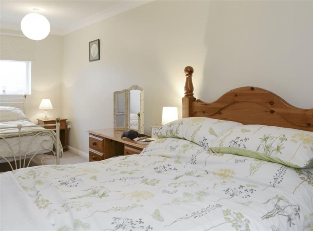 Family bedroom with a double and a single bed at The Annexe in Knaresborough, North Yorkshire