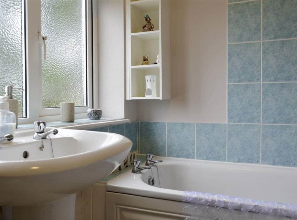 Bathroom with shower over bath at The Annexe in Neenton, near Bridgnorth, Shropshire