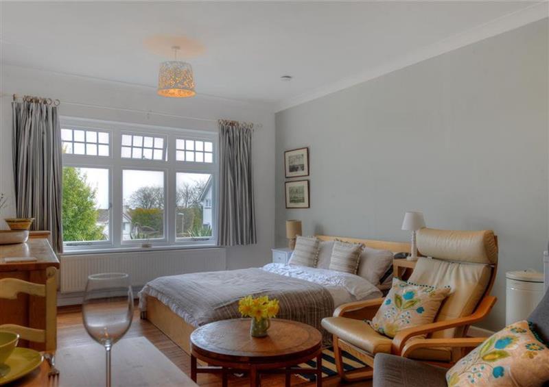 Relax in the living area at The Apartment at Queen Annes Lodge, Lyme Regis