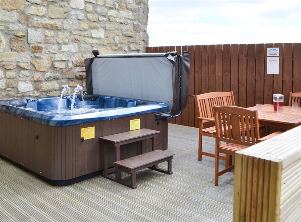 Relax in the private hot tub at The Arches in Longdyke, near Morpeth, Northumberland