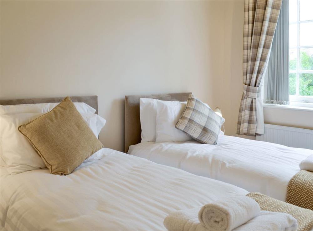 Comfortable twin bedroom at The Arches in Scarborough, North Yorkshire