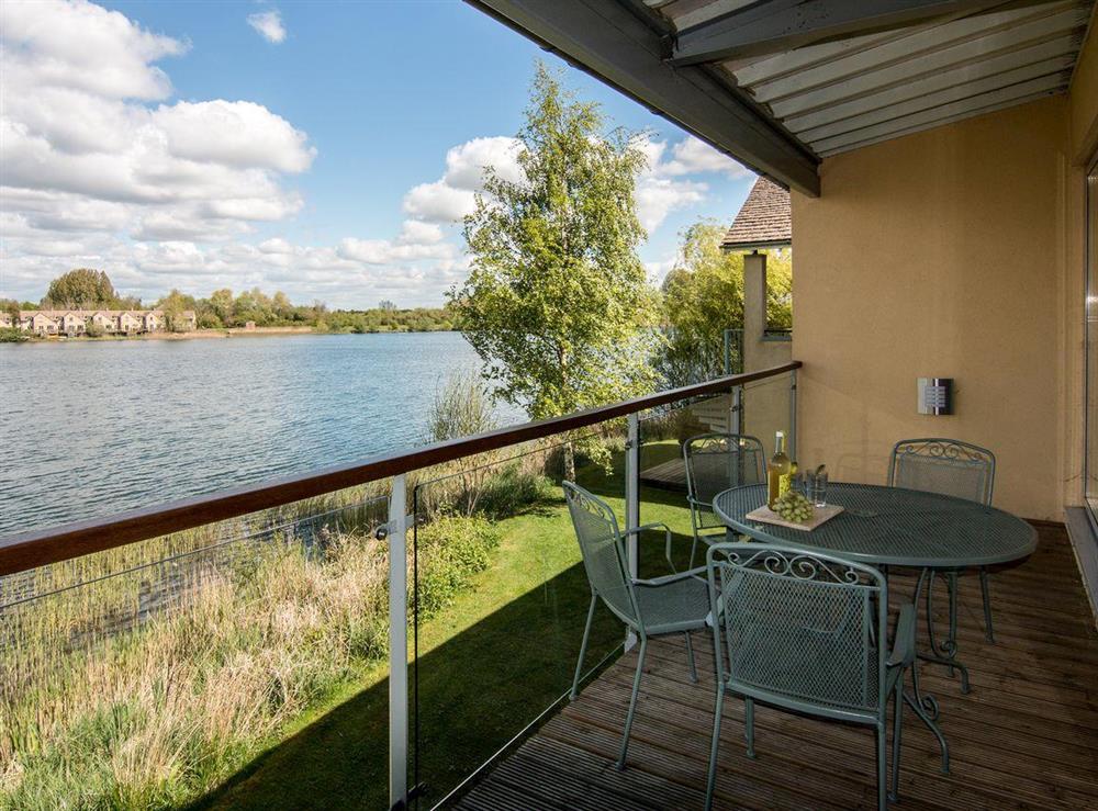 Balcony with lake view at The Augusta House in Somerford Keynes, Gloucestershire