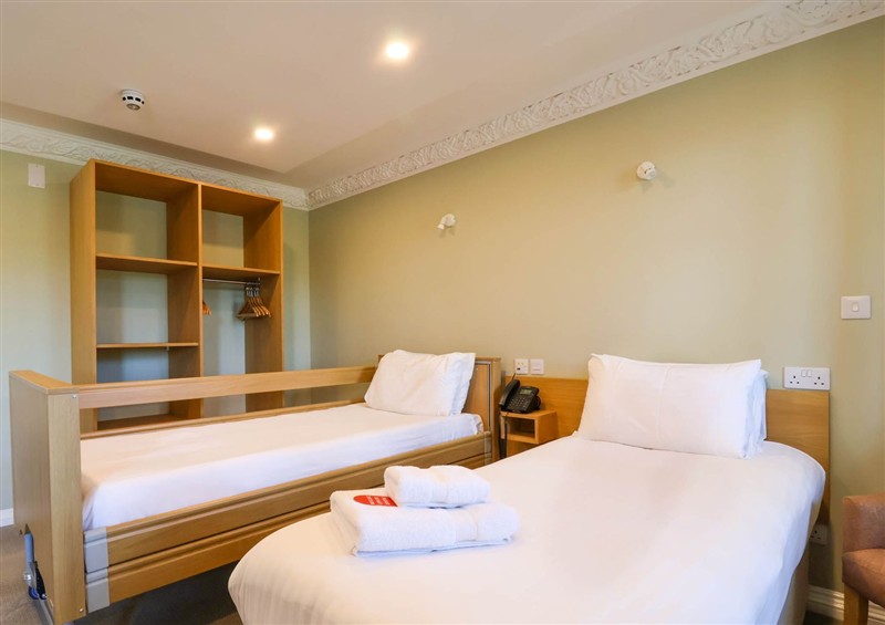 This is the bedroom at The Babbling Brook Nook, Chudleigh