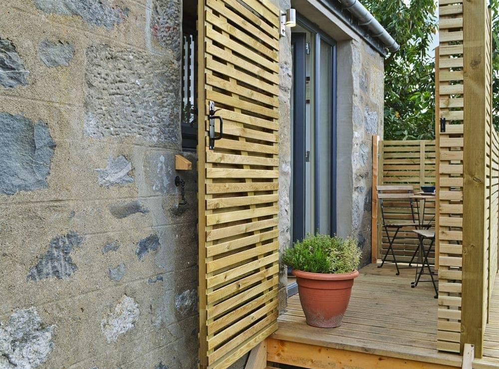 Small enclosed private deck at The Bakehouse At Caman House in Newtonmore, Inverness-Shire