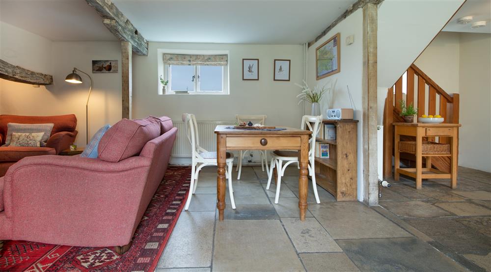The sitting room and dining area at The Bakehouse in Isle Of Purbeck, Dorset