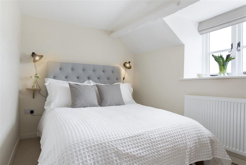 Bedroom one with 4’6 double bed at The Bakery, Moreton-in-Marsh