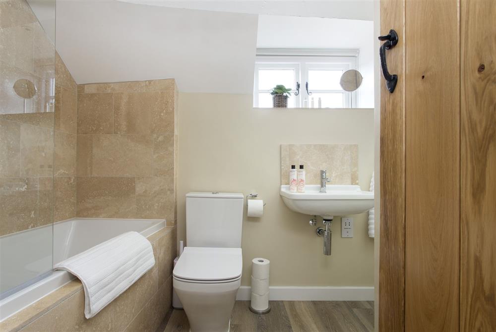 Family bathroom with over bath mixer shower at The Bakery, Moreton-in-Marsh