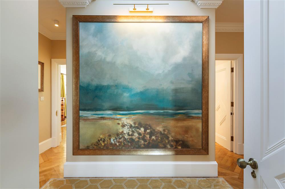 Returning to the ground floor, a unique floor to ceiling artwork complements the style and beauty of The Ballroom