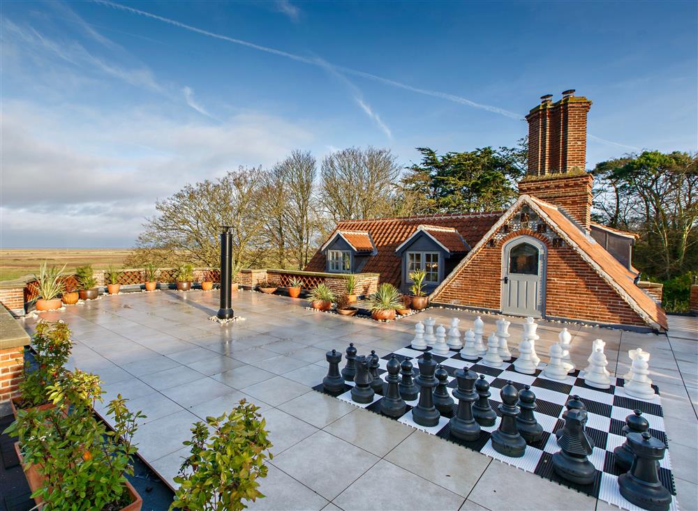 Rooftop terrace enjoying far-reaching views and a giant chess set at The Ballroom, Blakeney