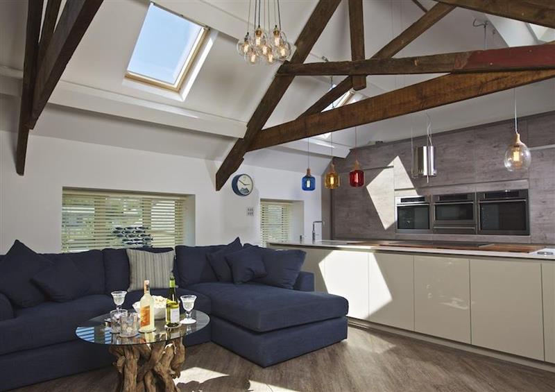Relax in the living area at The Barn, 20 At The Beach, Torcross