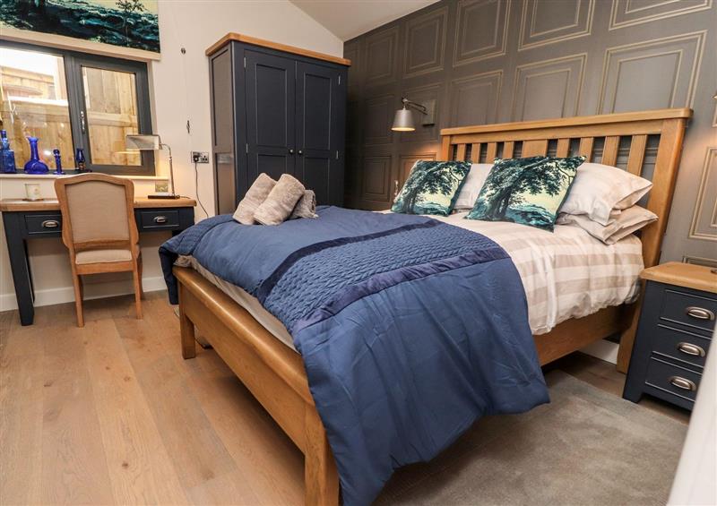 A bedroom in The Barn at Copy House Hideaway at The Barn at Copy House Hideaway, Earby
