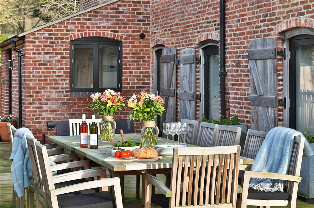 Enjoy alfresco dining on the front decked terrace