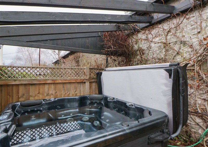 Spend some time in the hot tub at The Barn at Sunny Barn, Brecon