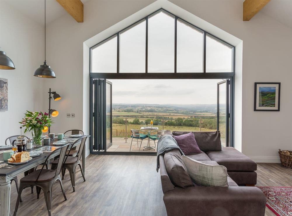 Bi-folding doors opening up to wonderful views at The Barn at Toft Hill Hall in Bishop Auckland, County Durham, England