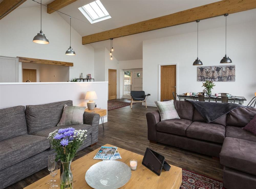 Open plan living space at The Barn at Toft Hill Hall in Bishop Auckland, County Durham, England