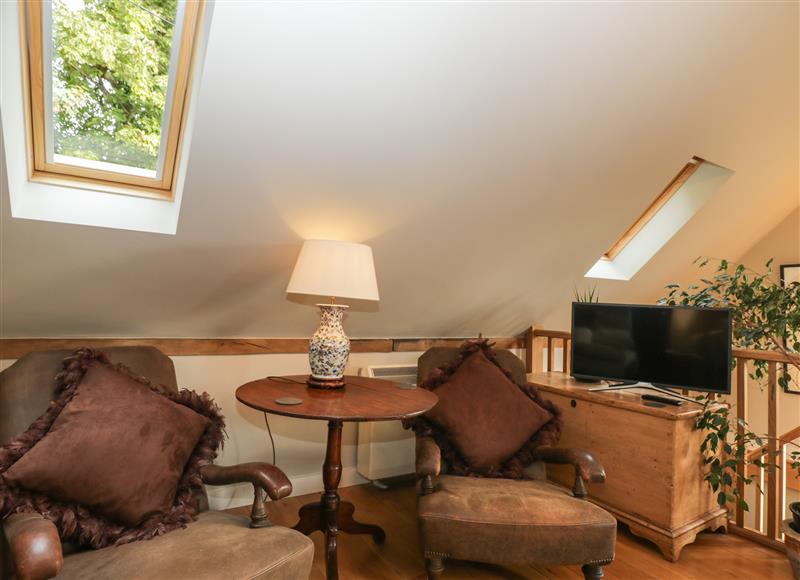 Relax in the living area (photo 3) at The Barn at Westhall Cottage, Fulbrook near Burford