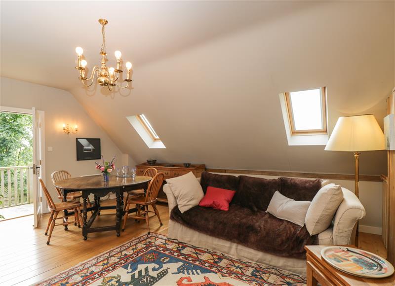 Relax in the living area at The Barn at Westhall Cottage, Fulbrook near Burford