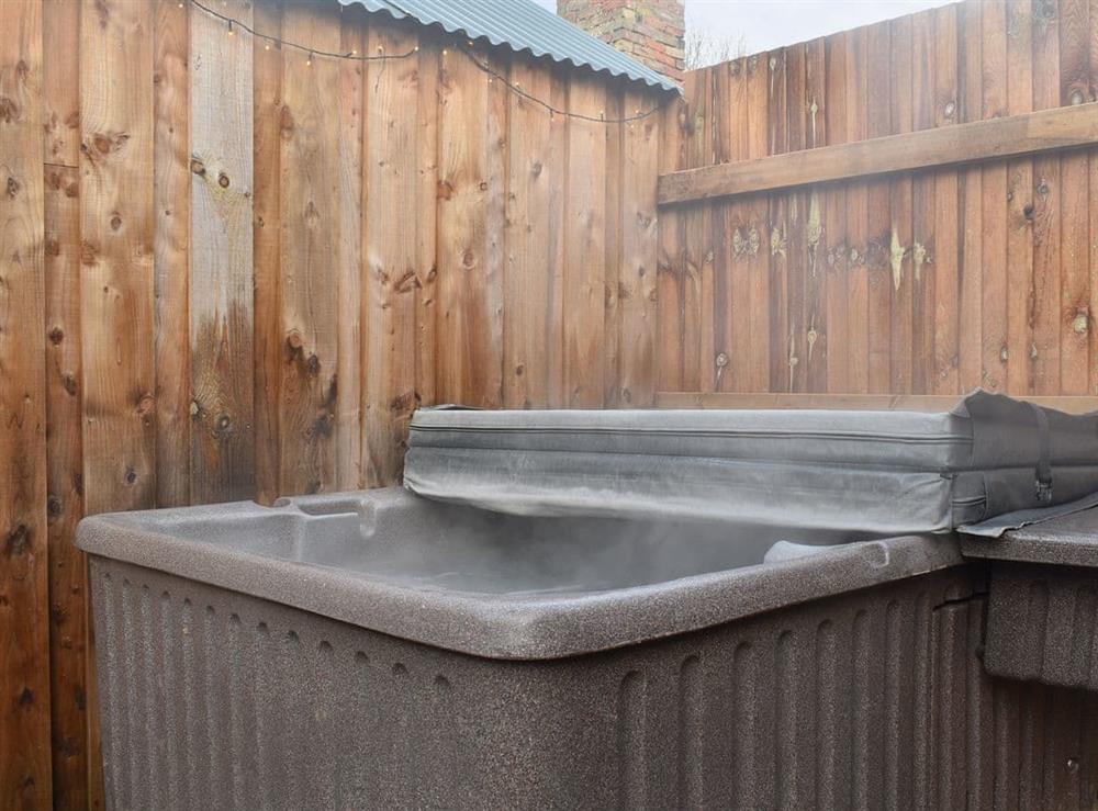 Relaxing hot tub at The Barn in Belton, near Great Yarmouth, Norfolk