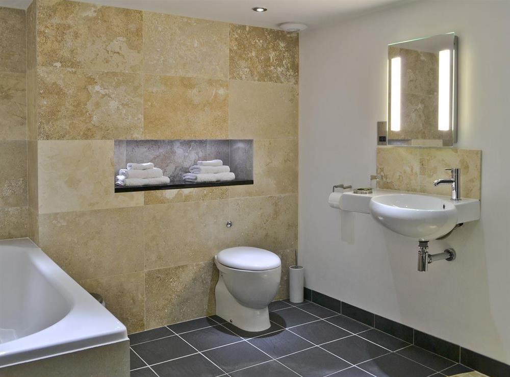 Luxury wet room with bath at The Barn in Brampton, Cumbria