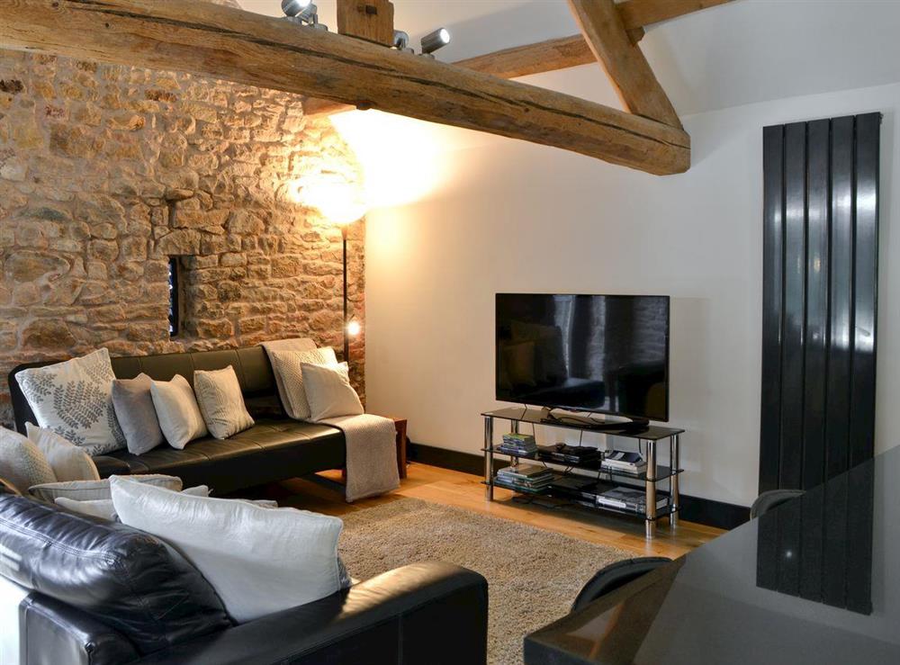 Thoughtfully converted open plan living area at The Barn in Brampton, Cumbria