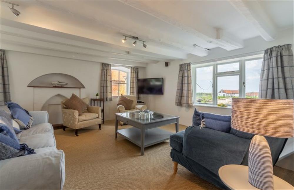First Floor: The sitting room with views over the staithe at The Barn, Burnham Overy Staithe near Kings Lynn