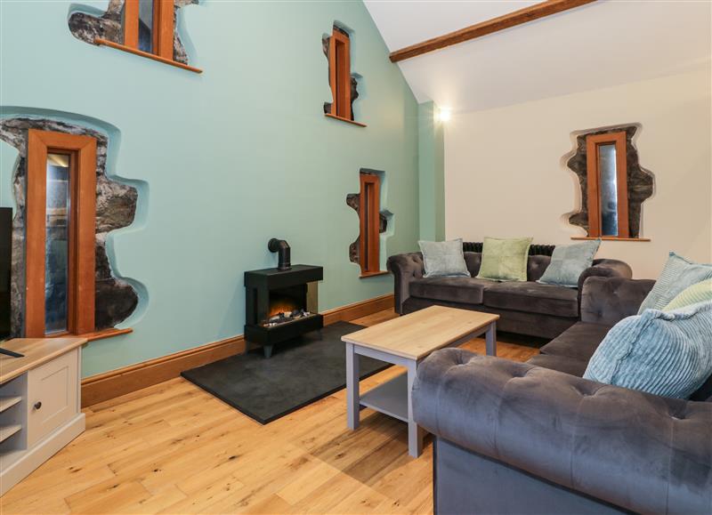 Relax in the living area at The Barn by Lyons, Talybont near Barmouth