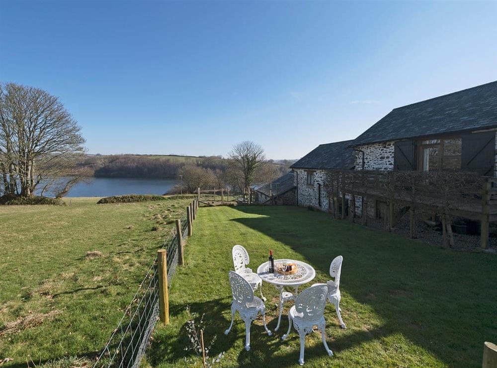 Breathtaking lake views from property at The Barn by The Lake in Brompton Regis, near Dulverton, Somerset