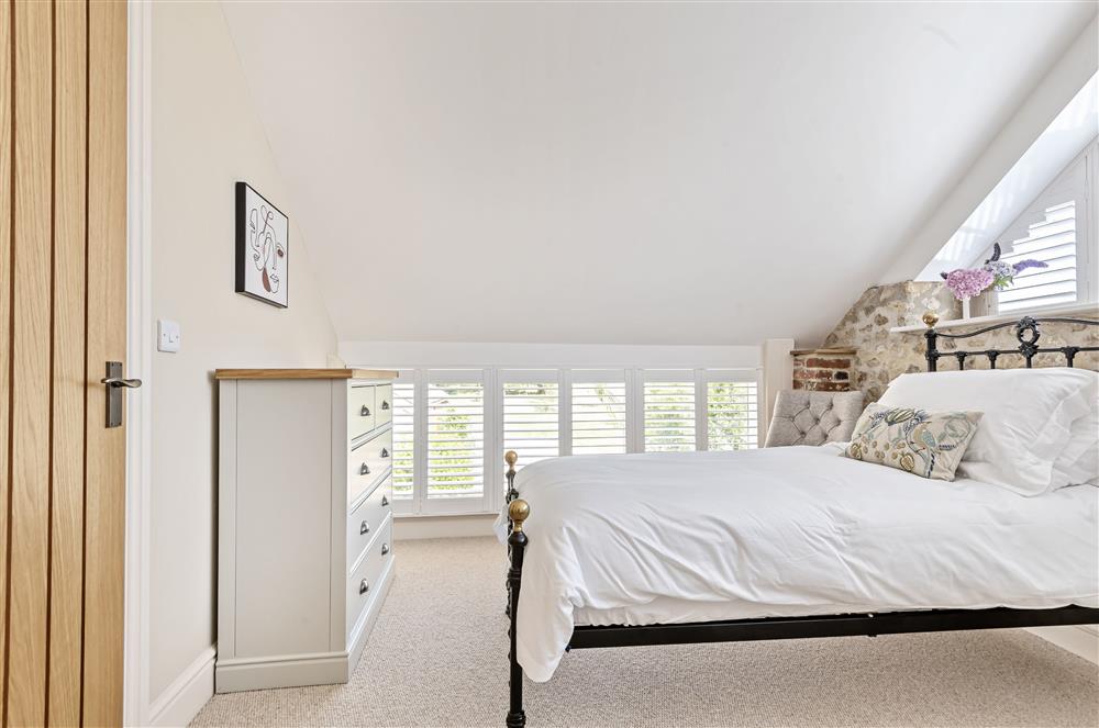 Stylish bedroom two with twin 3’ single beds at The Barn, Chard, West Dorset