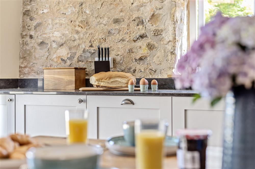 The exposed stone walls offer characterful features cleverly combined with contemporary styling