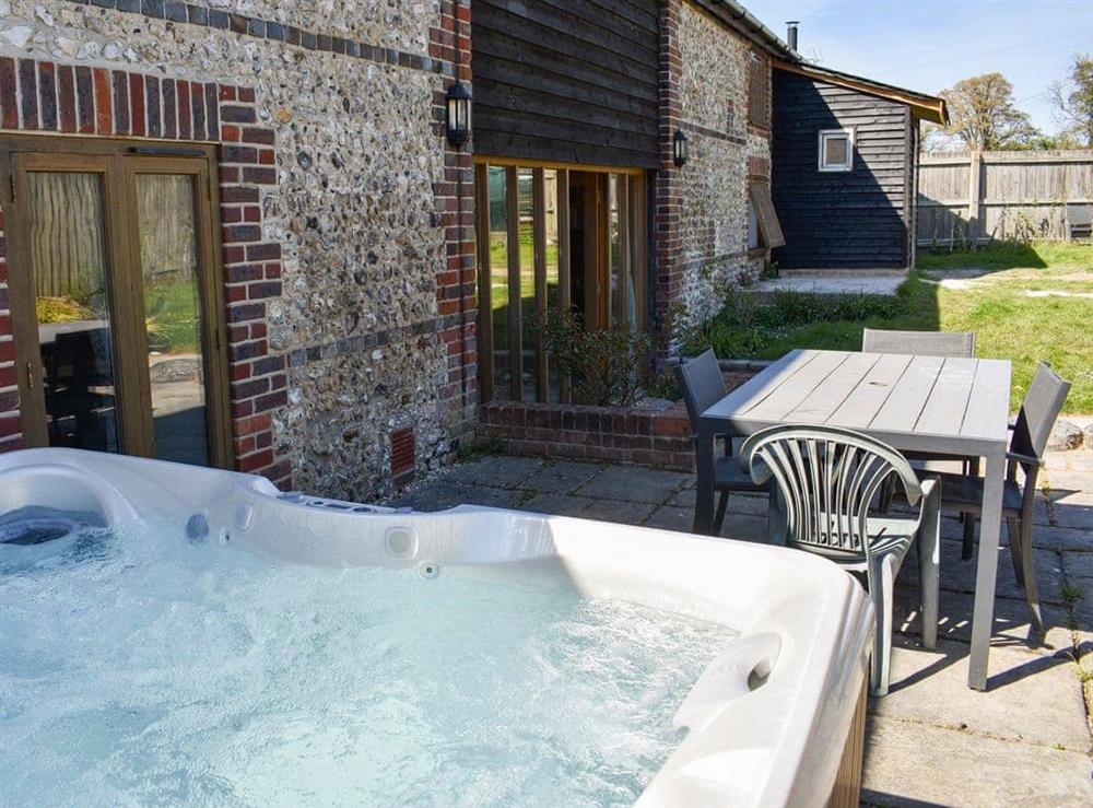 Hot tub at The Barn in Compton, near Chichester, West Sussex