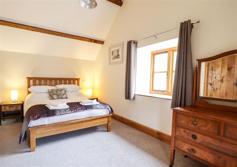 One of the 5 bedrooms at The Barn, Corwen