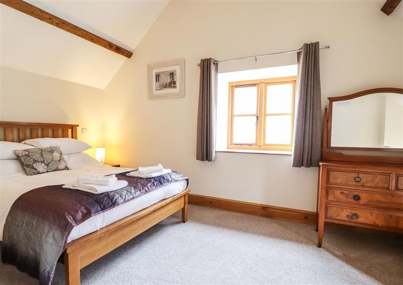This is a bedroom at The Barn, Corwen