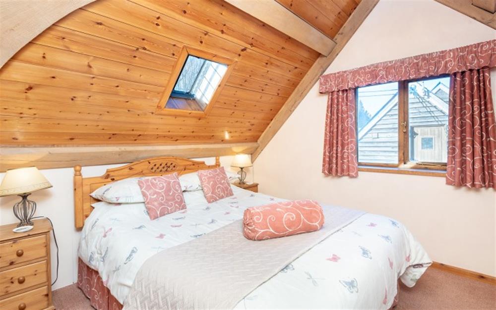 The double bedroom.  Comfortable and full of character at The Barn, Elsdon in Lyme Regis