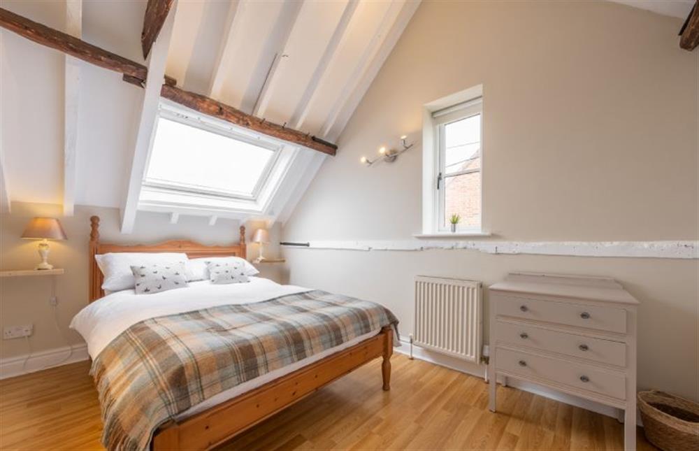 First floor: Bedroom three with a double bed at The Barn, Great Ryburgh near Fakenham
